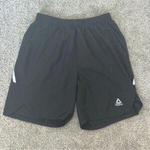 Reebok shorts size small black with white logo